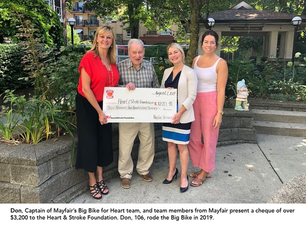 Don, Captain of Mayfair’s Big Bike for Heart team, and team members from Mayfair present a cheque of over $3,200 to the Heart & Stroke Foundation. Don, 106, rode the Big Bike in 2019.