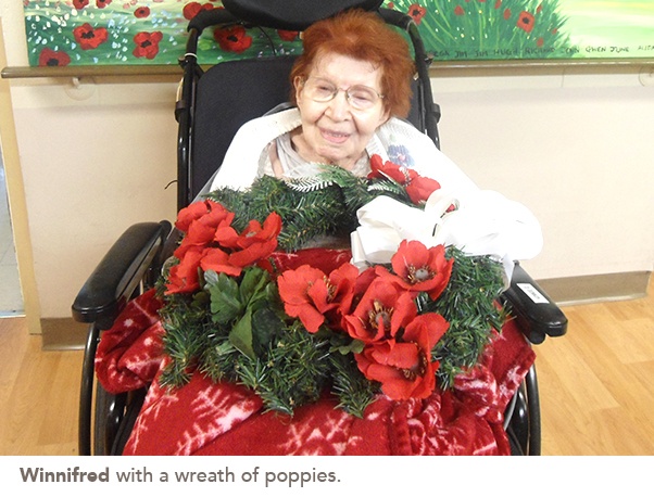 picture of Winnifred with a wreath of poppies