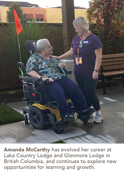 photo of Amanda McCarthey and a female resident having a fun conversation.