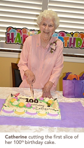 picture of Catherine cutting her birthday cake