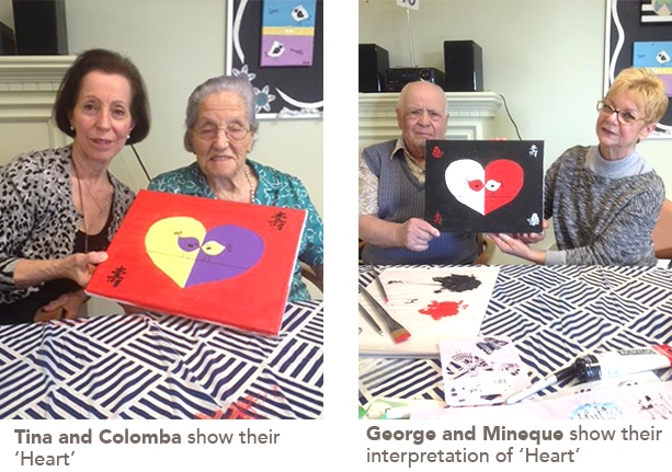 residents showing their paintings