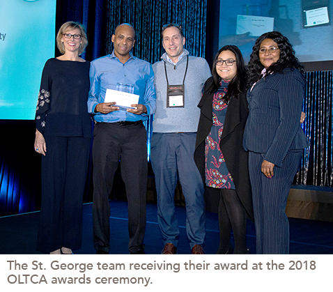 group photo of the St. George team receiving their award at the 2018 OLTCA awards ceremony.